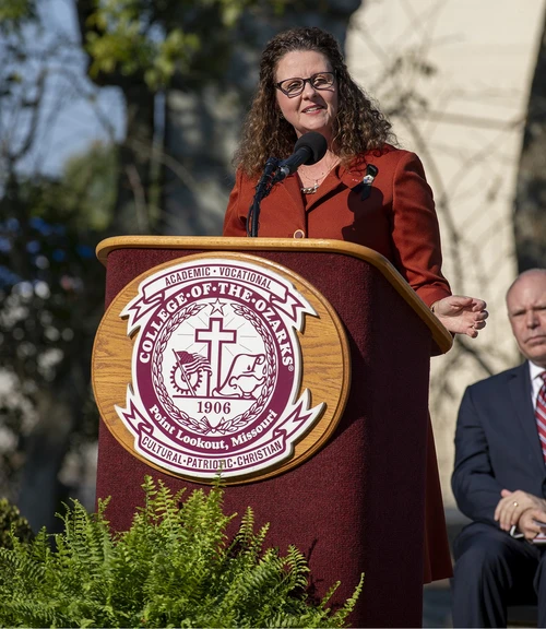 Capt. Lohmeyer speaking at podium